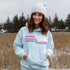 This gender neutral hoodie features a colorful line graphic that pays homage to the vibrant city of Winnipeg, Manitoba.