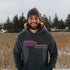 This gender neutral hoodie features a colorful line graphic that pays homage to the vibrant city of Winnipeg, Manitoba.
