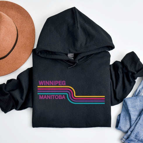 This gender neutral hoodie features a colorful line graphic that pays homage to the vibrant city of Winnipeg, Manitoba.