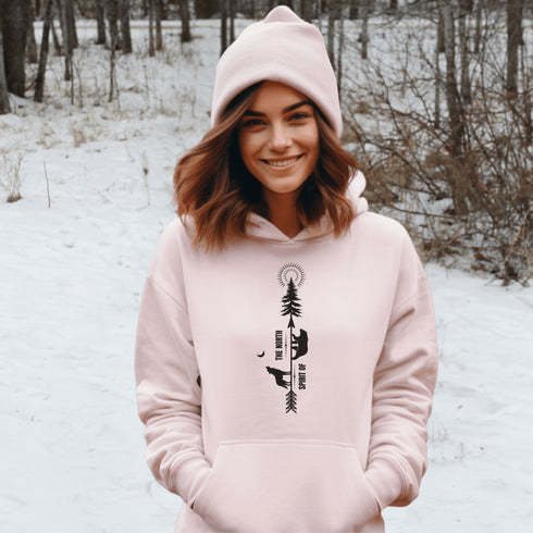 This hoodie features an eye-catching graphic that includes a Polar bear, a Wolf howling at the moon, and a tree with a sun.