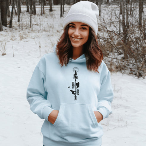 This hoodie features an eye-catching graphic that includes a Polar bear, a Wolf howling at the moon, and a tree with a sun.