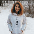 This hoodie features an eye-catching graphic that includes a Polar bear, a Wolf howling at the moon, and a tree with a sun.