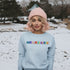 Introducing our newest addition to your wardrobe - the trendy graphic sweatshirt featuring colorful Winnipeg Scrabble Titles.