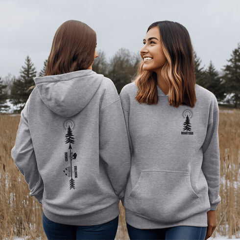 This hoodie features a unique design that showcases the beauty of Manitoba's nature icons, including prairie wheat, geese, bison, trees, and a big sun.