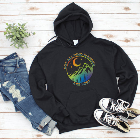 This hoodie features a colorful mountain graphic on the front and the inspiring saying "Not All Who Wander Are Lost" printed on the front.