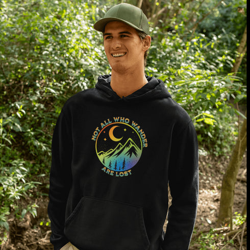 This hoodie features a colorful mountain graphic on the front and the inspiring saying "Not All Who Wander Are Lost" printed on the front.