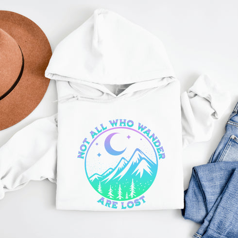 Introducing the perfect addition to your camping wardrobe - our one-of-a-kind hoodie featuring a colorful mountain graphic and the inspiring statement "Not All Who Wander Are Lost".
