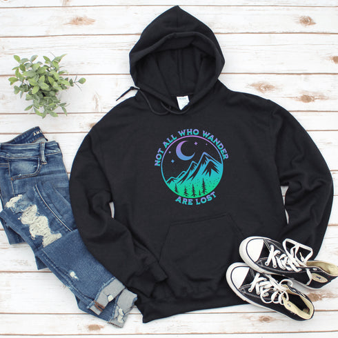 Introducing the perfect addition to your camping wardrobe - our one-of-a-kind hoodie featuring a colorful mountain graphic and the inspiring statement "Not All Who Wander Are Lost".
