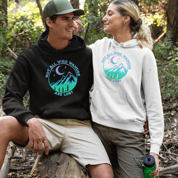 Introducing the perfect addition to your camping wardrobe - our one-of-a-kind hoodie featuring a colorful mountain graphic and the inspiring statement "Not All Who Wander Are Lost".