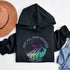 Introducing the perfect hoodie for your next outdoor adventure - our colorful mountain graphic hoodie that says "Not All Who Wander Are Lost".