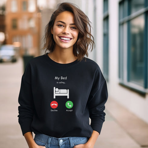 Introducing the ultimate sweatshirt for all those who love their bed more than anything else - the My Bed Is Calling Sweatshirt! Featuring a hilarious stick figure lying in bed, this sweatshirt is the perfect way to show off your love for all things cozy and comfortable.