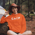 This cozy and comfortable Camping hoodie is the ultimate must-have for anyone who loves the great outdoors.