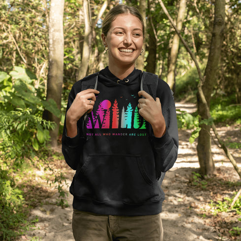 This Camping hoodie features a stunning colorful gradient forest graphic that captures the essence of the great outdoors. With the inspiring saying "WILD-Not All Who Wander Are Lost" boldly printed, it serves as a reminder to embrace your wild spirit and wanderlust.