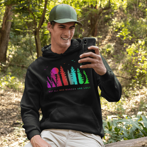 This Camping hoodie features a stunning colorful gradient forest graphic that captures the essence of the great outdoors. With the inspiring saying "WILD-Not All Who Wander Are Lost" boldly printed, it serves as a reminder to embrace your wild spirit and wanderlust.