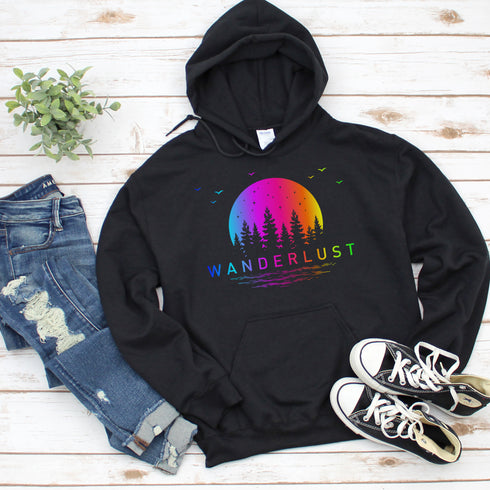 This hoodie features a vibrant and colorful gradient nature scene that will transport you to the great outdoors every time you wear it. The word "Wanderlust" emblazoned across the front serves as a reminder of your passion for exploration and the call of the wild.