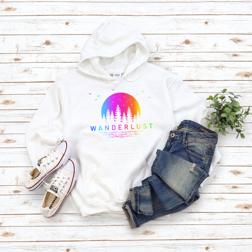 This hoodie features a vibrant and colorful gradient nature scene that will transport you to the great outdoors every time you wear it. The word "Wanderlust" emblazoned across the front serves as a reminder of your passion for exploration and the call of the wild.