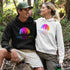 This hoodie features a vibrant and colorful gradient nature scene that will transport you to the great outdoors every time you wear it. The word "Wanderlust" emblazoned across the front serves as a reminder of your passion for exploration and the call of the wild.