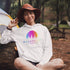 This hoodie features a vibrant and colorful gradient nature scene that will transport you to the great outdoors every time you wear it. The word "Wanderlust" emblazoned across the front serves as a reminder of your passion for exploration and the call of the wild.