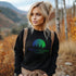 This crewneck features a vibrant and colorful gradient nature scene that will transport you to the great outdoors every time you wear it. The word "Wanderlust" emblazoned across the front serves as a reminder of your passion for exploration and the call of the wild.