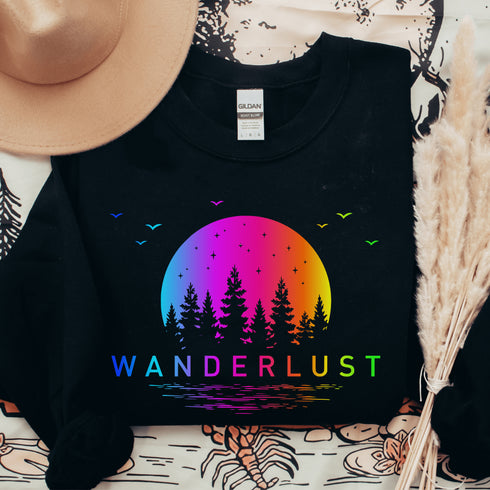 This crewneck features a vibrant and colorful gradient nature scene that will transport you to the great outdoors every time you wear it. The word "Wanderlust" emblazoned across the front serves as a reminder of your passion for exploration and the call of the wild.
