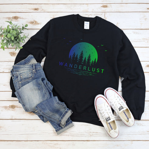 This crewneck features a vibrant and colorful gradient nature scene that will transport you to the great outdoors every time you wear it. The word "Wanderlust" emblazoned across the front serves as a reminder of your passion for exploration and the call of the wild.