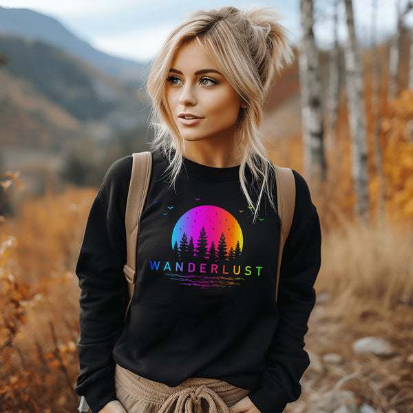 This crewneck features a vibrant and colorful gradient nature scene that will transport you to the great outdoors every time you wear it. The word "Wanderlust" emblazoned across the front serves as a reminder of your passion for exploration and the call of the wild.