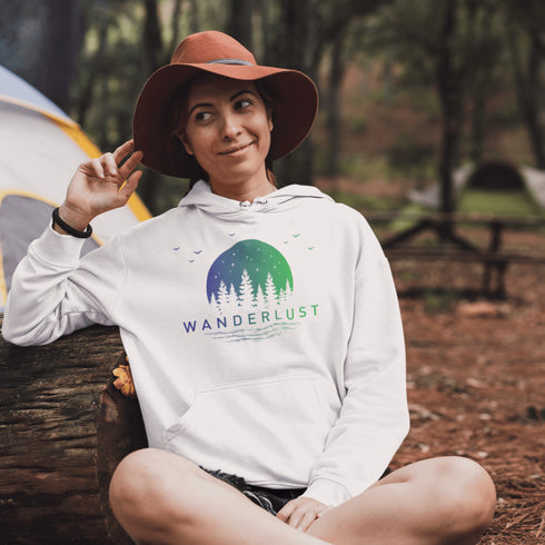 This hooded sweatshirt features a vibrant and colorful gradient nature scene that will transport you to the great outdoors every time you wear it. The word "Wanderlust" emblazoned across the front serves as a reminder of your passion for exploration and the call of the wild.