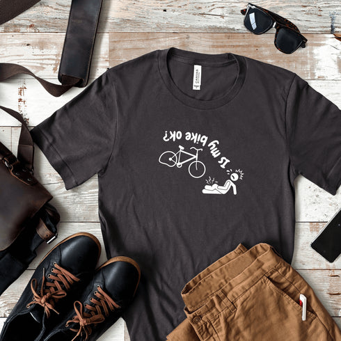 This hilarious design features a stick man in a classic bike fail moment - falling off a bike with a flat tire, all while asking the important question upside down.