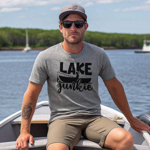 Introducing our "Lake Junkie" fishing t-shirt! This shirt is perfect for those who can't resist the call of the lake and are always looking for their next big catch (or maybe just a relaxing day on the water).