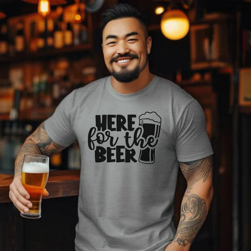 Introducing the ultimate beer-lover's fashion statement - the "Here For The Beer" t-shirt! Whether you're a craft beer connoisseur or just enjoy a cold one after a long day, this shirt screams, "I'm here for a good time and a pint of ale!"
