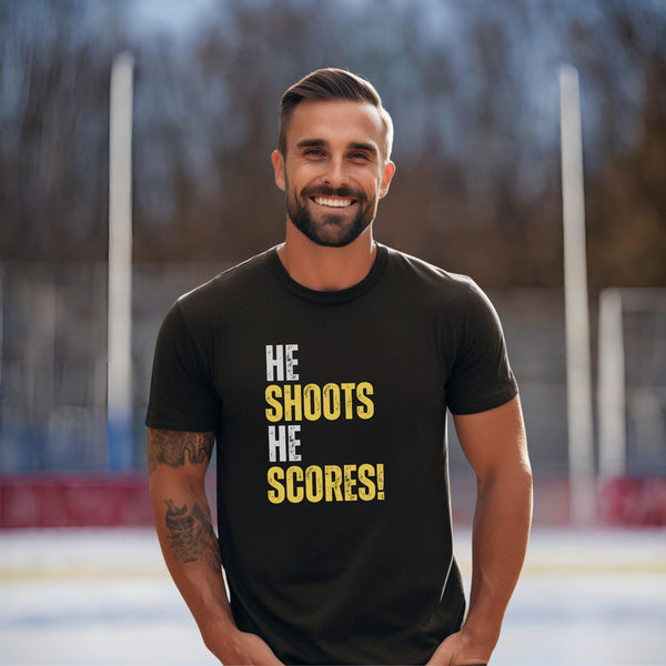 Introducing the ultimate shirt for hockey fans and players alike - the "He Shoots He Scores!" tee! This shirt is perfect for those who live and breathe the game, or for anyone who just enjoys a good laugh.
