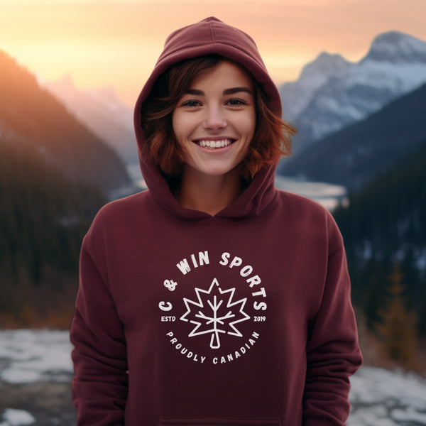 This stylish hoodie features a striking maple leaf graphic emblazoned on the front, symbolizing your love for Canada.
