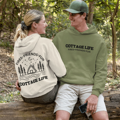 Introducing our new gender-neutral hoodie with a camping theme and a cozy cottage design that reads "Cottage Life."