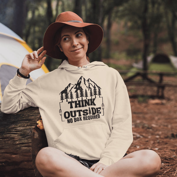 Introducing our gender-neutral hoodie featuring a stunning mountain scene and the inspiring phrase "Think Outside - No Box Required."