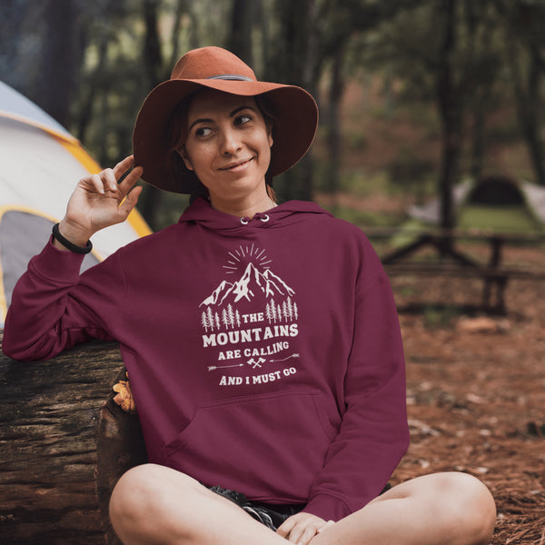 Introducing our new gender-neutral hoodie, perfect for outdoor enthusiasts! Featuring a mountain theme and the inspiring quote "The Mountains Are Calling And I Must Go", this hoodie is made with high-quality materials to keep you warm and comfortable on your next adventure.