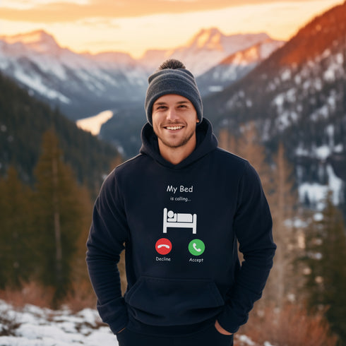 Introducing the ultimate hoodie for all those who love their bed more than anything else - the My Bed Is Calling hoodie! Featuring a hilarious stick figure lying in bed, this sweater is the perfect way to show off your love for all things cozy and comfortable.