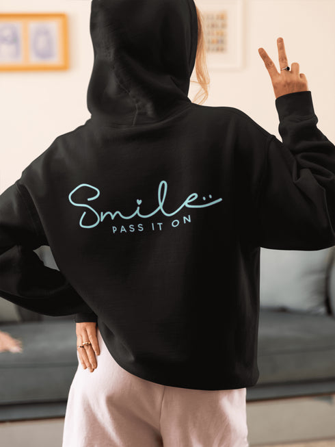 Introducing the ultimate mood lifter and smile inducer: the "Smile...Pass It On" Hoodie! Made with 100% organic cotton that's so soft, even a cactus would feel cuddly wearing it. This isn't just any hoodie; it's your wearable reminder to the world that happiness is contagious, and it starts with a simple smile.