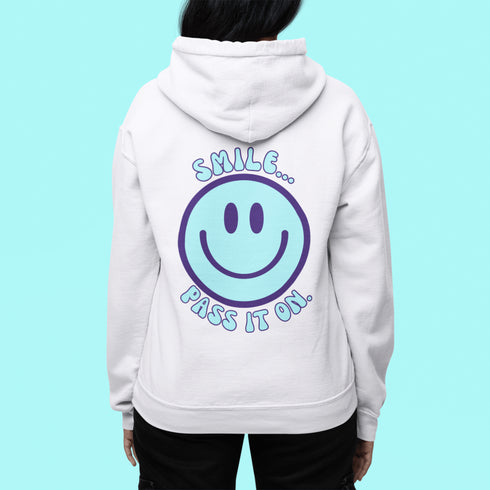 Introducing the latest must-have in your wardrobe that's guaranteed to turn frowns upside down: the Happy Face Hoodie emblazoned with the cheer-spreading command, "Smile...Pass it on." This isn't just any ordinary hoodie; it's your ticket to becoming a walking, talking (and very cozy) ambassador of joy!