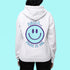 Introducing the latest must-have in your wardrobe that's guaranteed to turn frowns upside down: the Happy Face Hoodie emblazoned with the cheer-spreading command, "Smile...Pass it on." This isn't just any ordinary hoodie; it's your ticket to becoming a walking, talking (and very cozy) ambassador of joy!