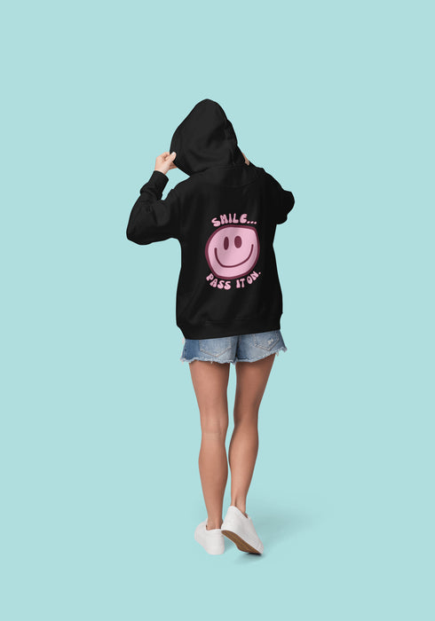Introducing the latest must-have in your wardrobe that's guaranteed to turn frowns upside down: the Happy Face Hoodie emblazoned with the cheer-spreading command, "Smile...Pass it on." This isn't just any ordinary hoodie; it's your ticket to becoming a walking, talking (and very cozy) ambassador of joy!