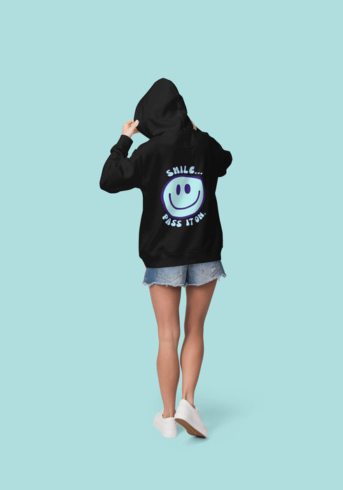 Introducing the latest must-have in your wardrobe that's guaranteed to turn frowns upside down: the Happy Face Hoodie emblazoned with the cheer-spreading command, "Smile...Pass it on." This isn't just any ordinary hoodie; it's your ticket to becoming a walking, talking (and very cozy) ambassador of joy!