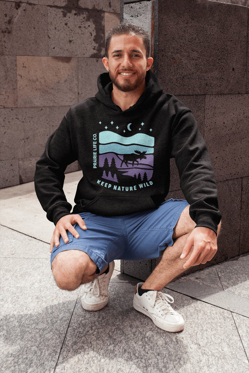 Featuring a minimalist moose design inspired by Canada’s untamed landscapes, this hoodie captures the simple joy of being present in nature.