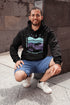Featuring a minimalist moose design inspired by Canada’s untamed landscapes, this hoodie captures the simple joy of being present in nature.