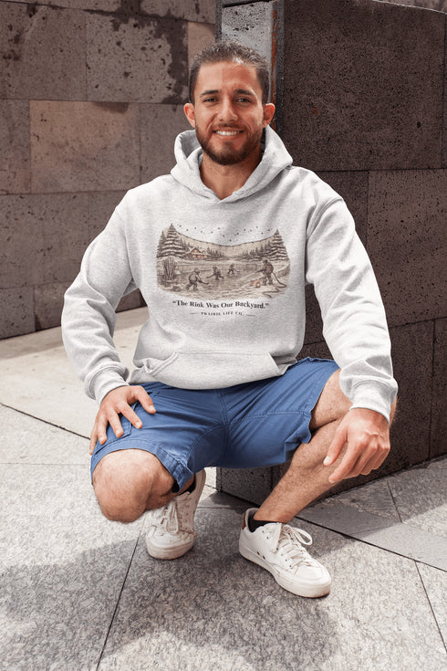The Rink Was Our Backyard Hoodie – nostalgic outdoor hockey sweatshirt inspired by backyard rink memories. Unisex fit. Multiple colors available.