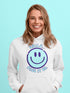 Introducing the ultimate mood booster in fabric form: the "Smile…Pass It On" Happy Face Hoodie! This isn't just any ordinary hoodie; it's a wearable ray of sunshine, guaranteed to spread joy, high-fives, and possibly even spontaneous dance-offs wherever you go.