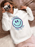Introducing the ultimate mood booster in fabric form: the "Smile…Pass It On" Happy Face Hoodie! This isn't just any ordinary hoodie; it's a wearable ray of sunshine, guaranteed to spread joy, high-fives, and possibly even spontaneous dance-offs wherever you go.
