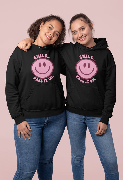 Introducing the ultimate mood booster in fabric form: the "Smile…Pass It On" Happy Face Hoodie! This isn't just any ordinary hoodie; it's a wearable ray of sunshine, guaranteed to spread joy, high-fives, and possibly even spontaneous dance-offs wherever you go.