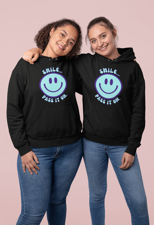 Introducing the ultimate mood booster in fabric form: the "Smile…Pass It On" Happy Face Hoodie! This isn't just any ordinary hoodie; it's a wearable ray of sunshine, guaranteed to spread joy, high-fives, and possibly even spontaneous dance-offs wherever you go.