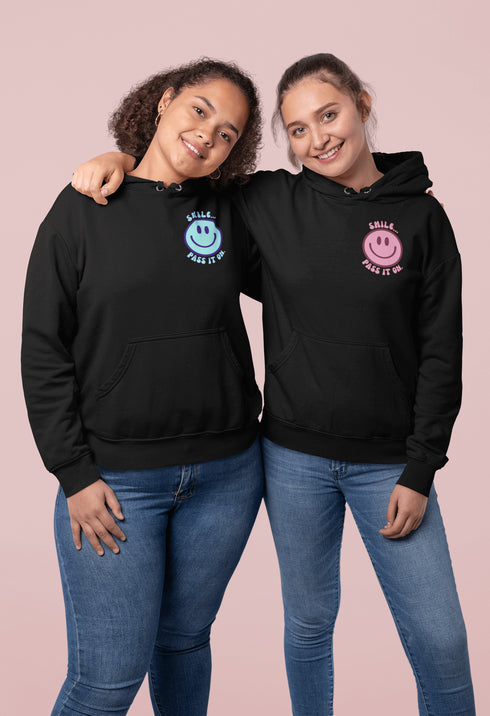 Introducing the latest must-have in your wardrobe that's guaranteed to turn frowns upside down: the Happy Face Hoodie emblazoned with the cheer-spreading command, "Smile...Pass it on." This isn't just any ordinary hoodie; it's your ticket to becoming a walking, talking (and very cozy) ambassador of joy!