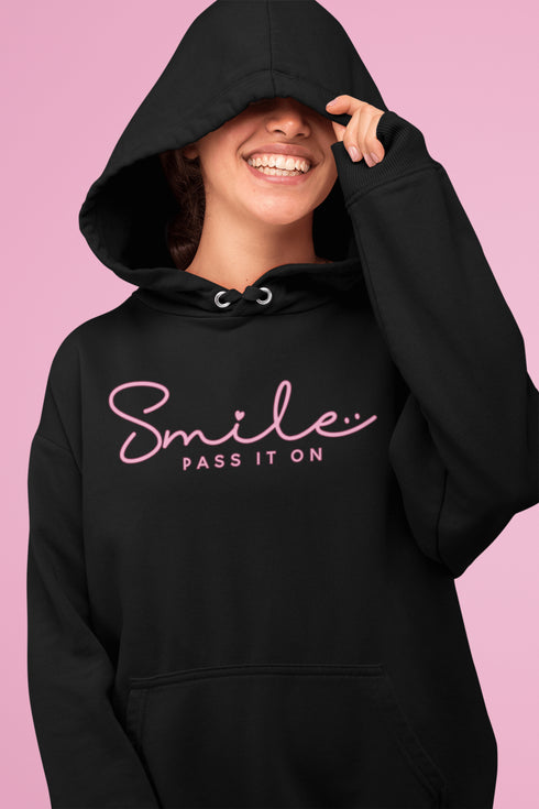 Introducing the latest in wearable cheer technology: the "Smile, Pass It On" Hoodie! This isn't just any ordinary hoodie. Oh no, it's your new best friend, fashion statement, and personal cheerleader all rolled into one cozy package.